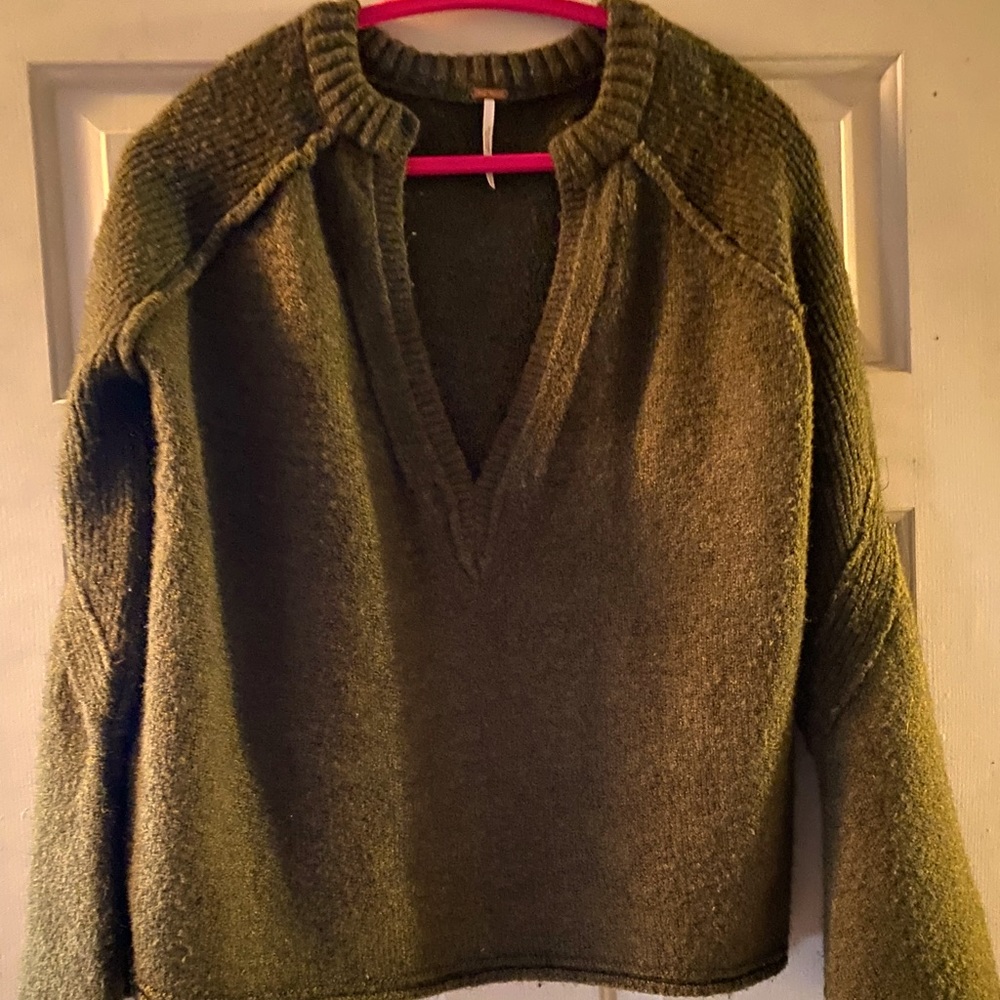 Free People bell sleeve olive green sweater with V neck.  Size small.